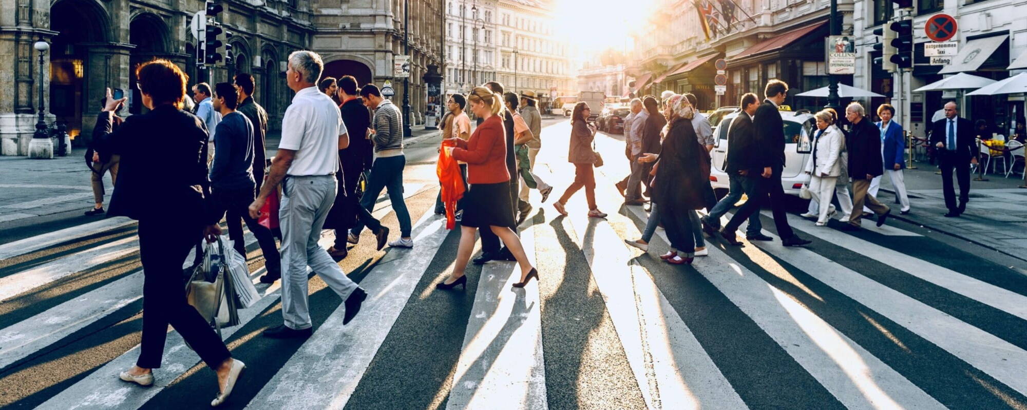 Different people crossing the road at the same time