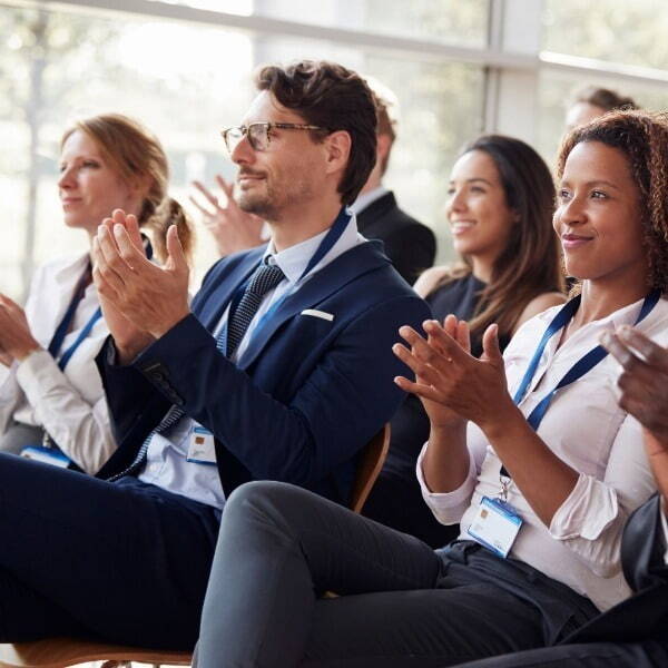 People clapping during a talk